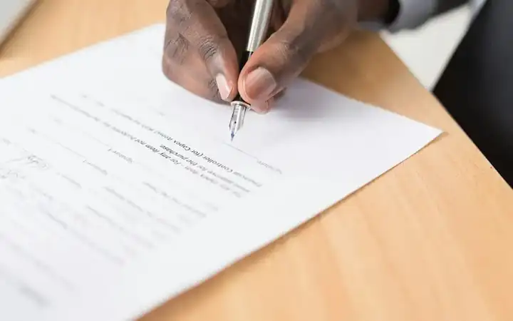 Person signing shipping documents